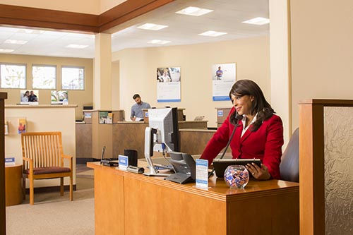 Bank employee on telephone