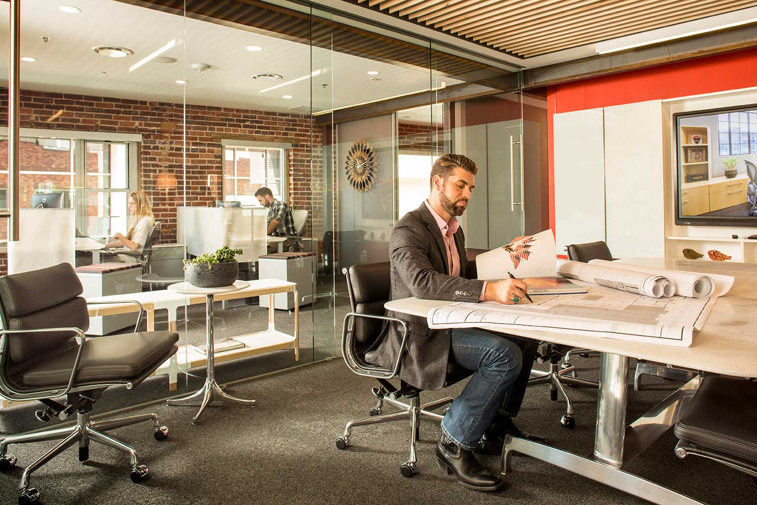 Architect works at a desk