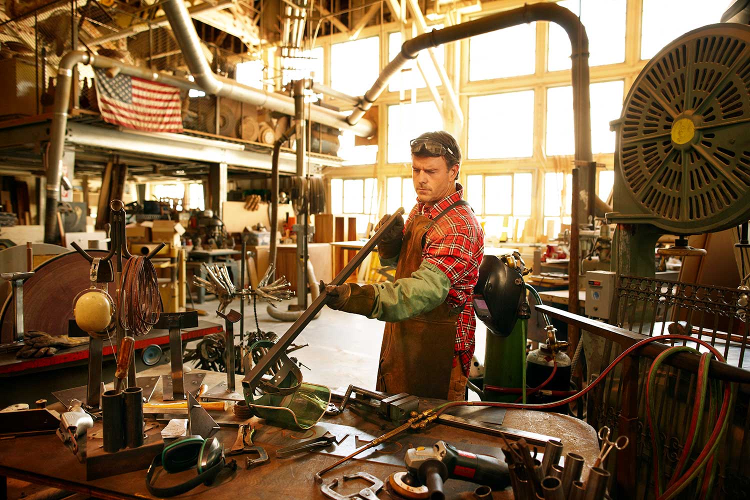 Man holding welding equiptment