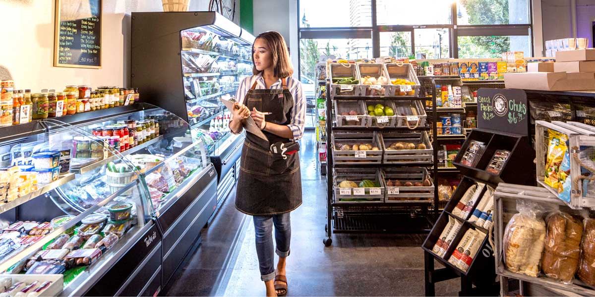 Grocer checking food