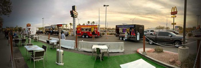 Hash House 2 Go Go Food Truck sits at a food truck roundup while customers order food