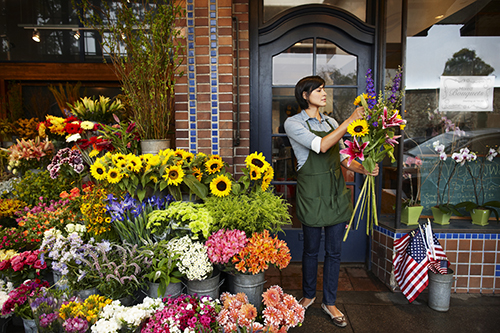 Small Business Saturday Florist Arranging Flowers