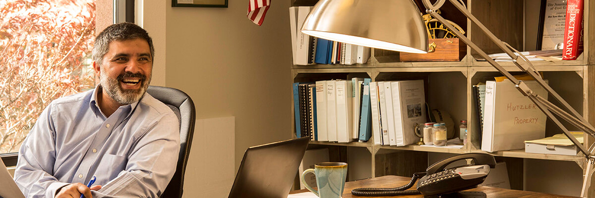 Business owner sitting at their desk