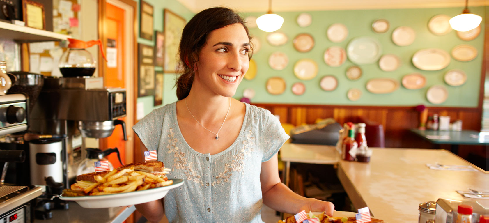 Waitress serving at a diner