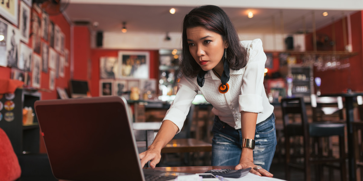 Women looking at a computer screen with a worried look